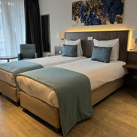 De Twee Linden Hotel Beneden-Leeuwen ภายนอก รูปภาพ